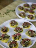 Mini-pizzas with pumpkin purée, mushrooms and cheese