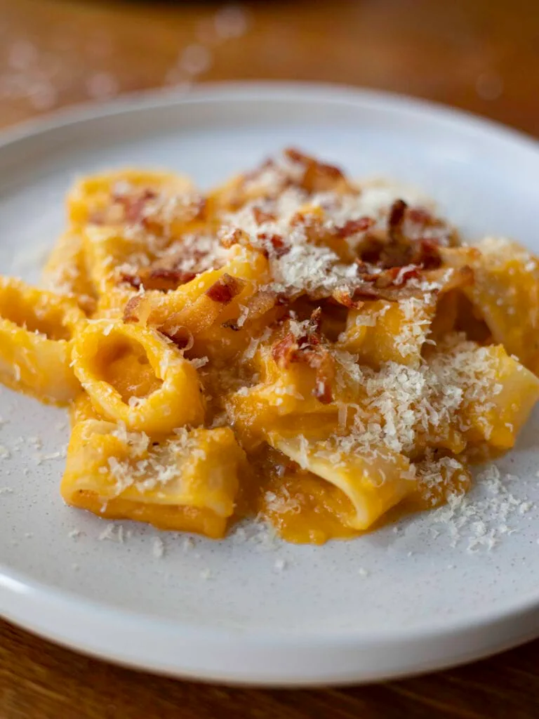 Butternut and guanciale calamarata pasta with parmesan