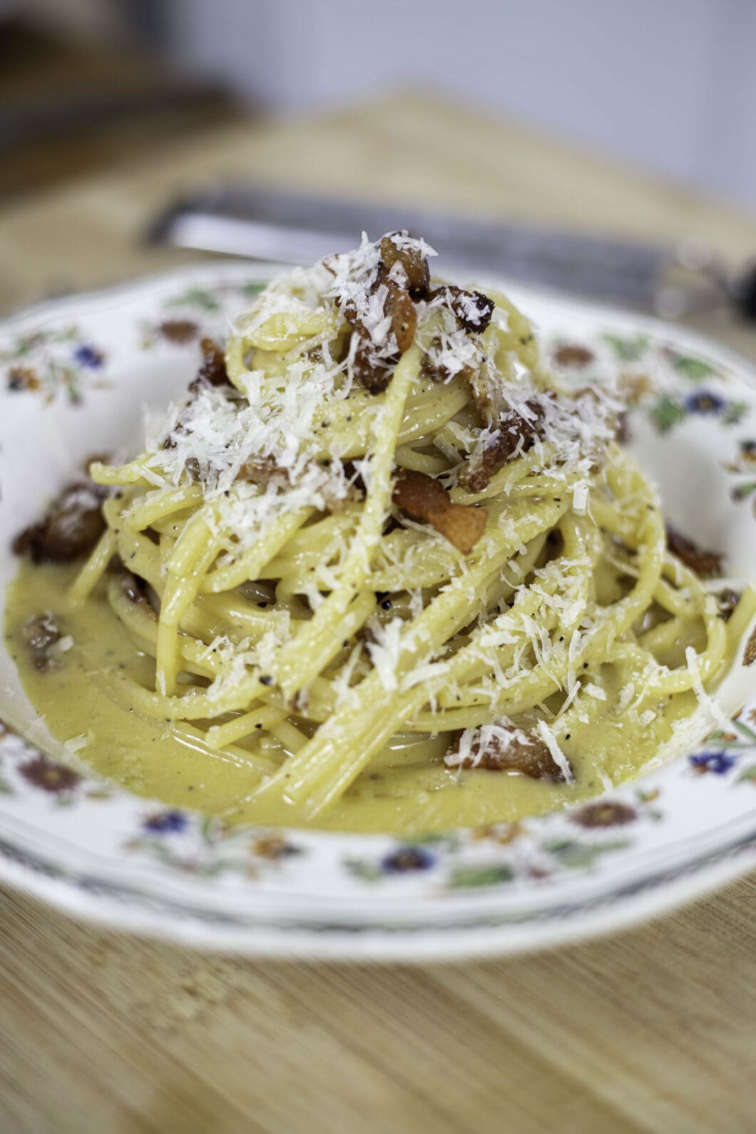 Authentic spaghetti alla carbonara with crispy guanciale and pecorino