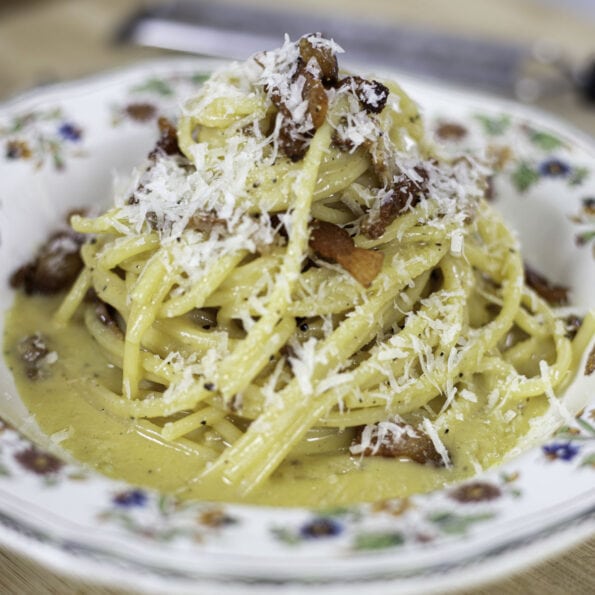 Authentic spaghetti alla carbonara with crispy guanciale and pecorino