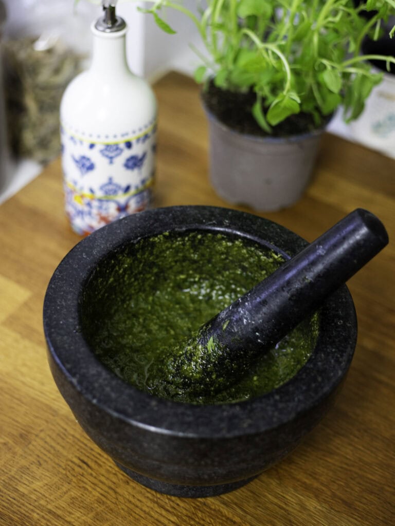 Basil pesto in a mortar