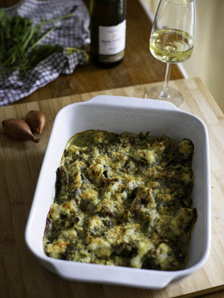 Baked fish and broccoli with a sorrel sauce