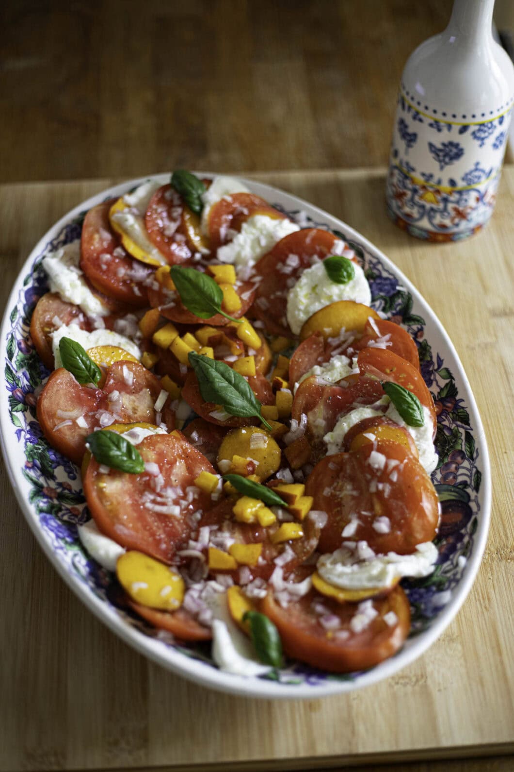 Tomatoes, mozzarella, nectarines, shallots, basil