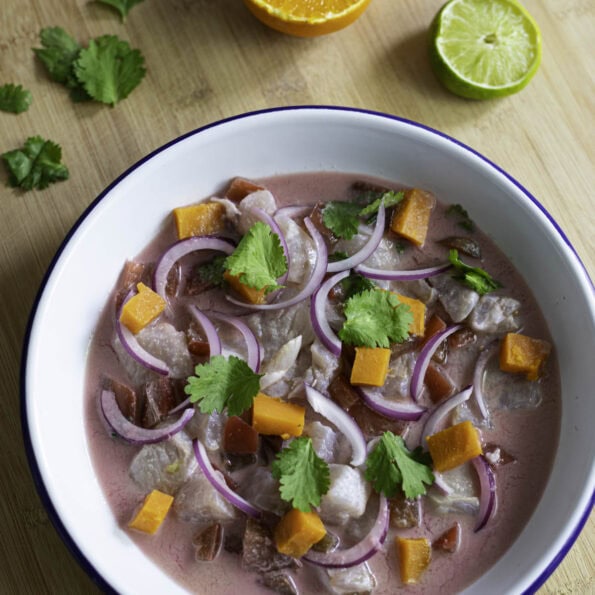 Peruvian Pink Ceviche with tomatoes, sweet potatoes, red onion and cilantro