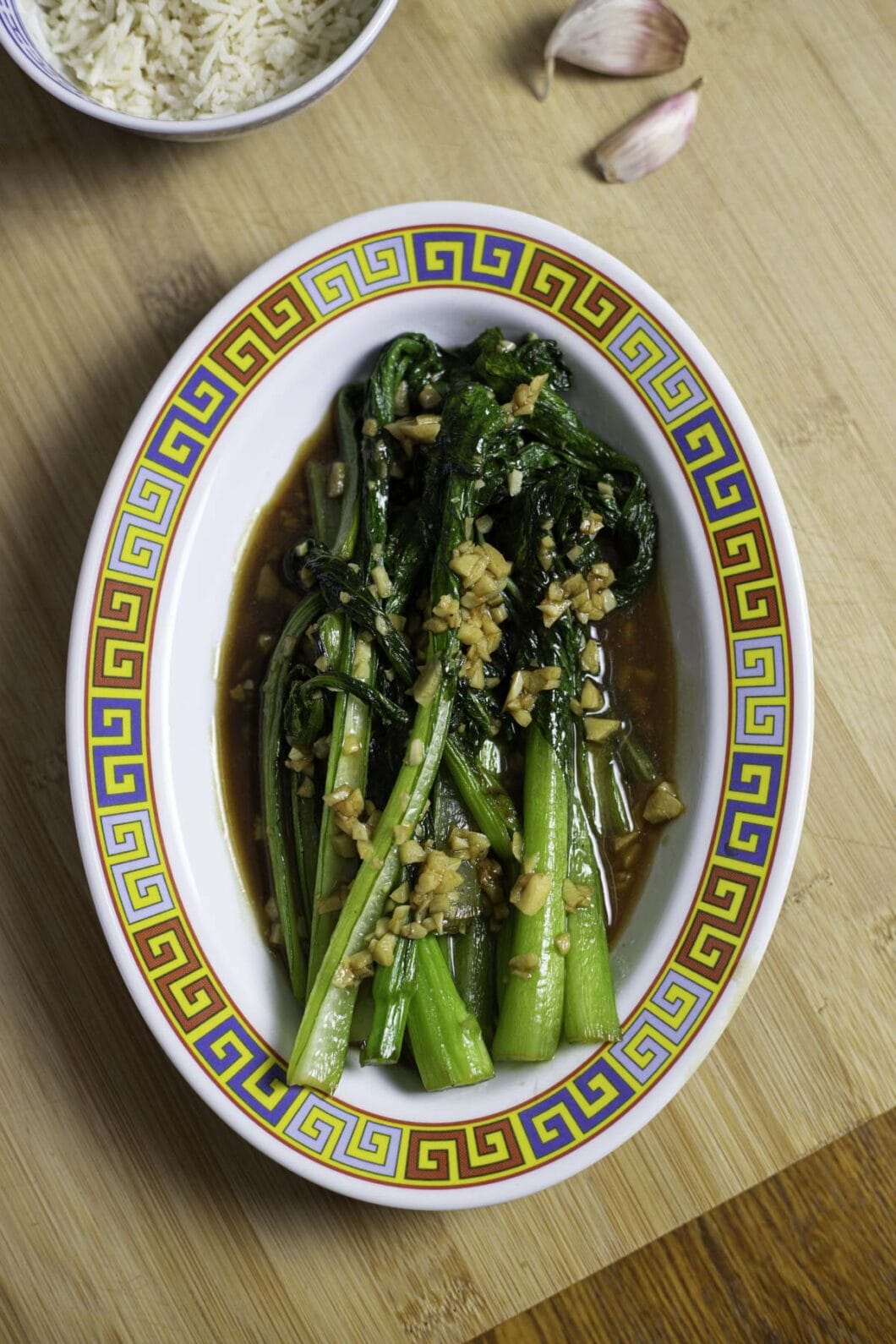 Stir-fried Chinese greens (You Cai or Choy Sum) with soy sauce, oyster sauce and garlic