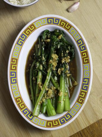 Stir-fried Chinese greens (You Cai or Choy Sum) with soy sauce, oyster sauce and garlic