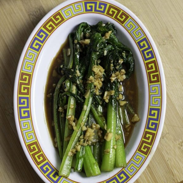 Stir-fried Chinese greens (You Cai or Choy Sum) with soy sauce, oyster sauce and garlic