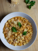 Creamy pasta e fagioli in a orangey, creamy broth made with veggies and pancetta