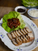 Easy Bossam, pork belly slices with kimchi, lettuce leaves, rice and ssamjang