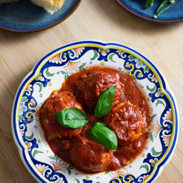 Ricotta polpette in sugo (with tomato sauce), accompanied by Focaccia and green beans