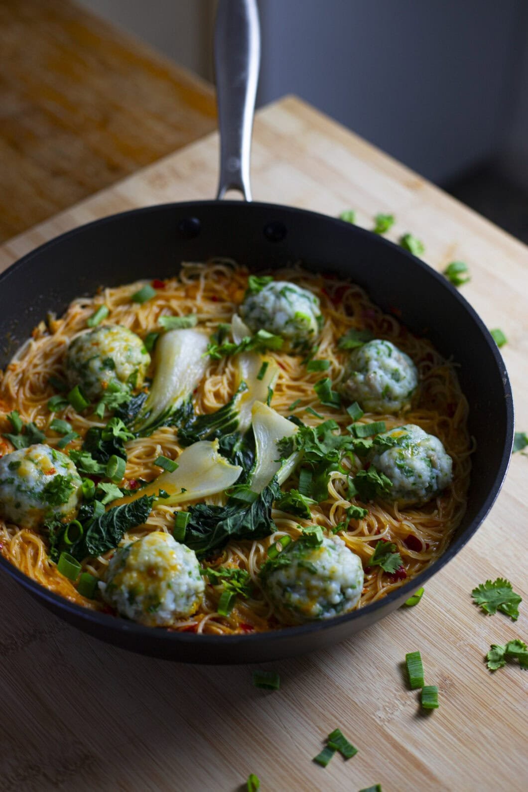 Curry Noodles with fisballs, pak choi and a red thai curry broth