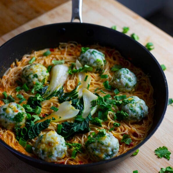 Curry Noodles with fisballs, pak choi and a red thai curry broth