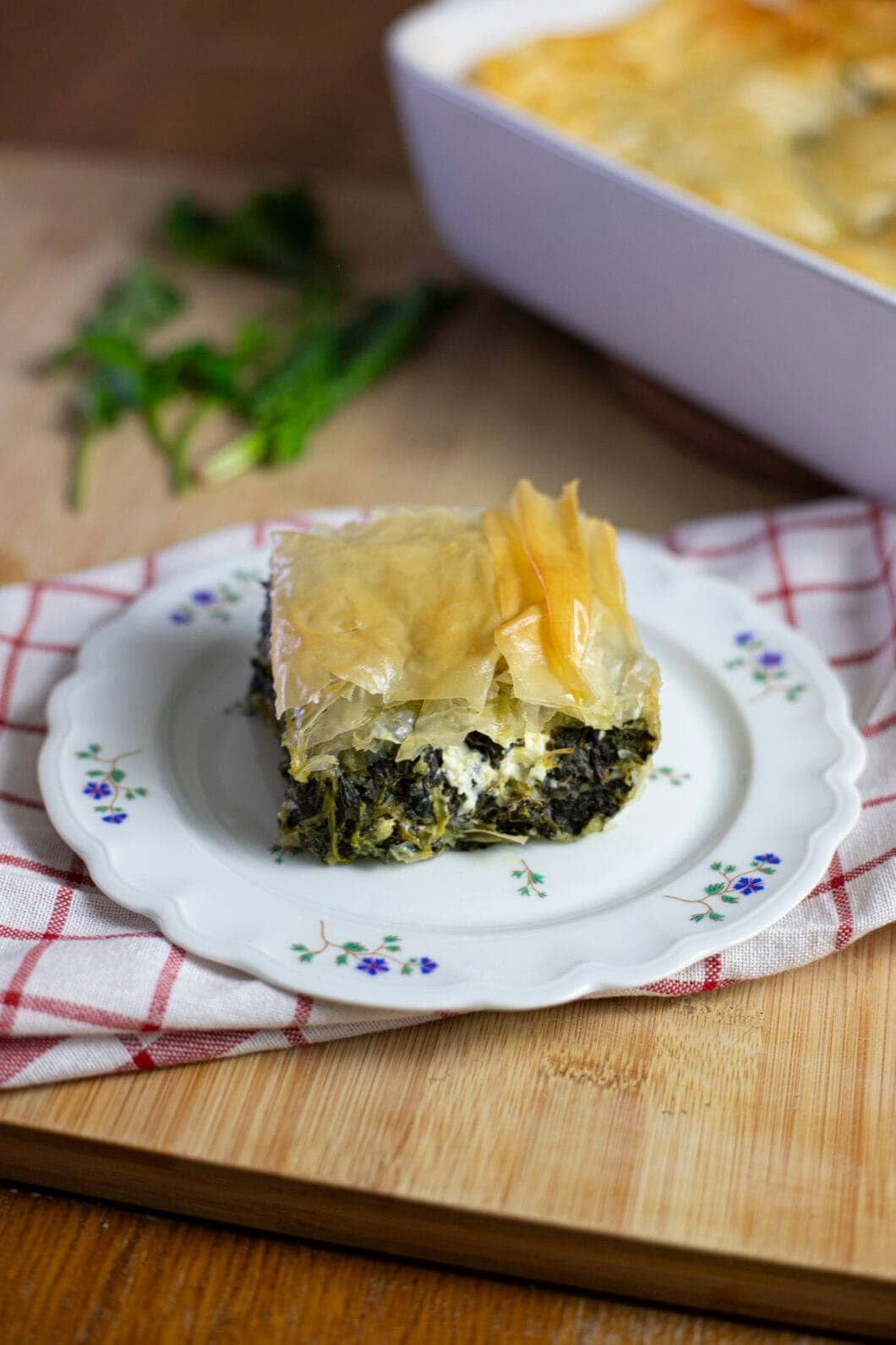 Greek Spanakopita - flaky pie with spinach, feta, dill, mint, and parsley