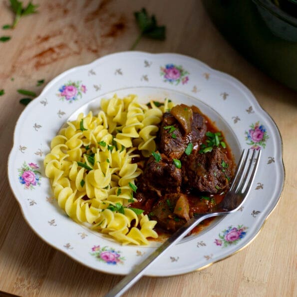 Hungarian paprika and beef stew (Porkolt) with egg pasta