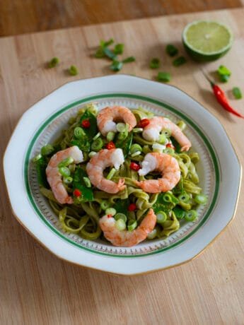 Shrimp noodle salad with a Thai-inspired green sauce and green onions