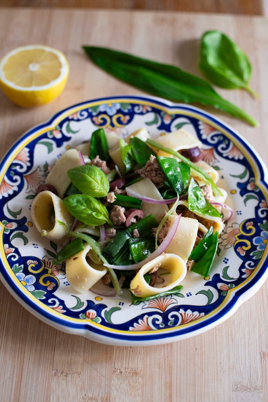 Umami Tuna pasta salad with snap peas, red onions, basil and wild garlic