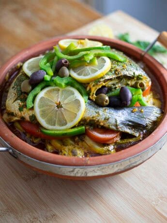 Sea bream tagine with vegetables, olives and lemon