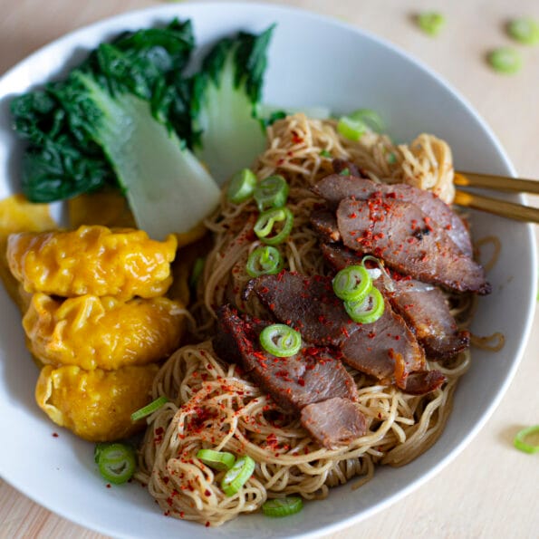 Dry Char Siu Noodles with wontons and baby bok choy