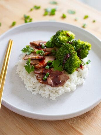 Charsiu Pork with red sauce and rice and broccoli