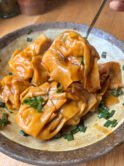 Juicy pork wontons tossed in a glossy soy sauce dressing with scallions. Fast, comforting and ridiculously satisfying.