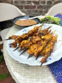 BBQ Chicken satay skewers, peanut sauce, ajaad and lettuce