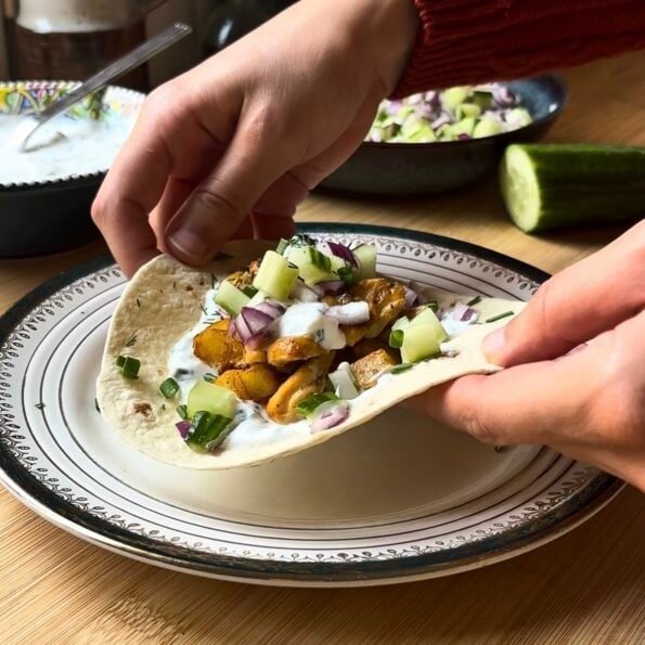 gyros tacos - tacos with potatoes, chicken, garlic yogurt, cucumber, onion, parsley and dill