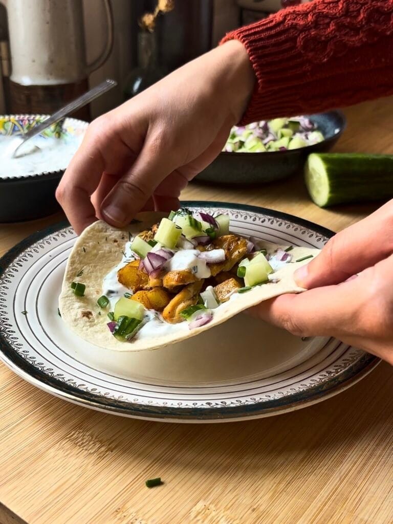 gyros tacos - tacos with potatoes, chicken, garlic yogurt, cucumber, onion, parsley and dill