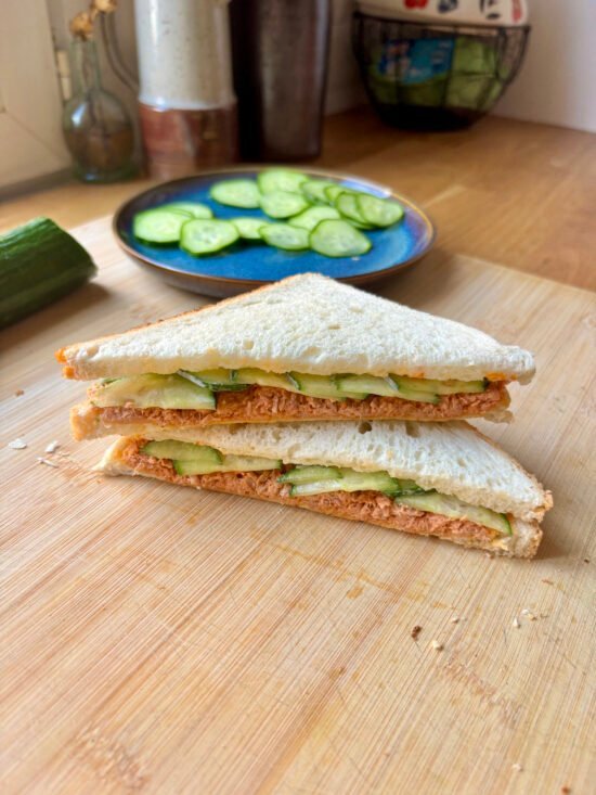 spicy tuna sandwich with cucumber slices