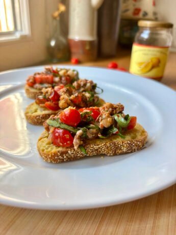 toasts with a sardine and tomatoes mixture