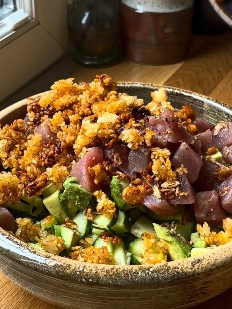 Crispy raw tuna salad with crunchy rice cucumber avocado