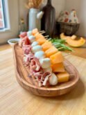 Melon skewers with mozza balls and parma ham, and a side thai sauce