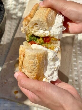 Burrata sandwich with confit tomatoes and pesto