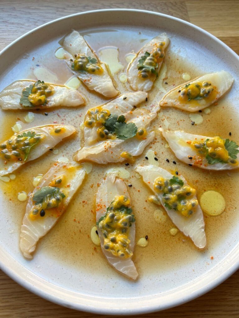 White fish crudo with passionfruit and a ponzu sauce