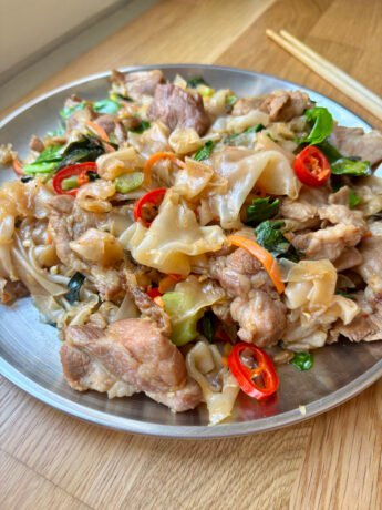Drunken noodles - wide noodles with pork, veggies and chilies