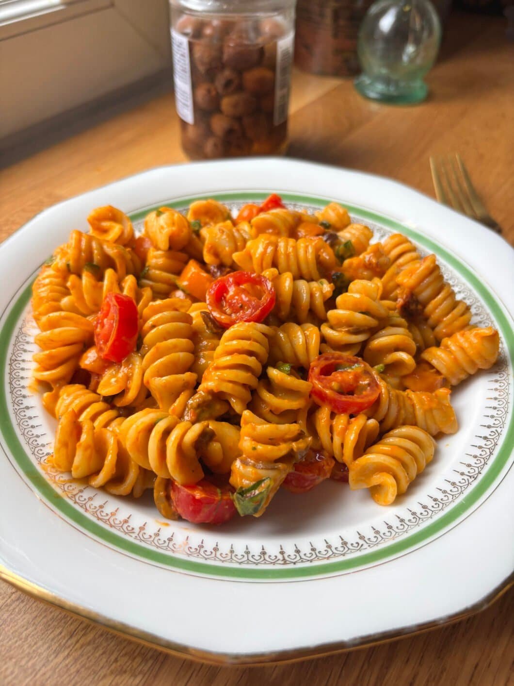 Super saucy pasta with a raw cherry tomato sauce, topped with some more fresh cherry tomatoes