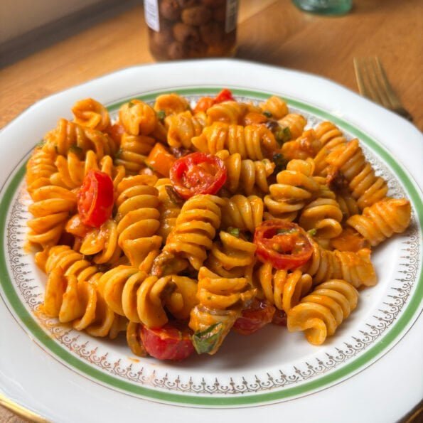 Super saucy pasta with a raw cherry tomato sauce, topped with some more fresh cherry tomatoes