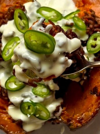 Roasted sweet potato with melted cheddar cream and jalapenos